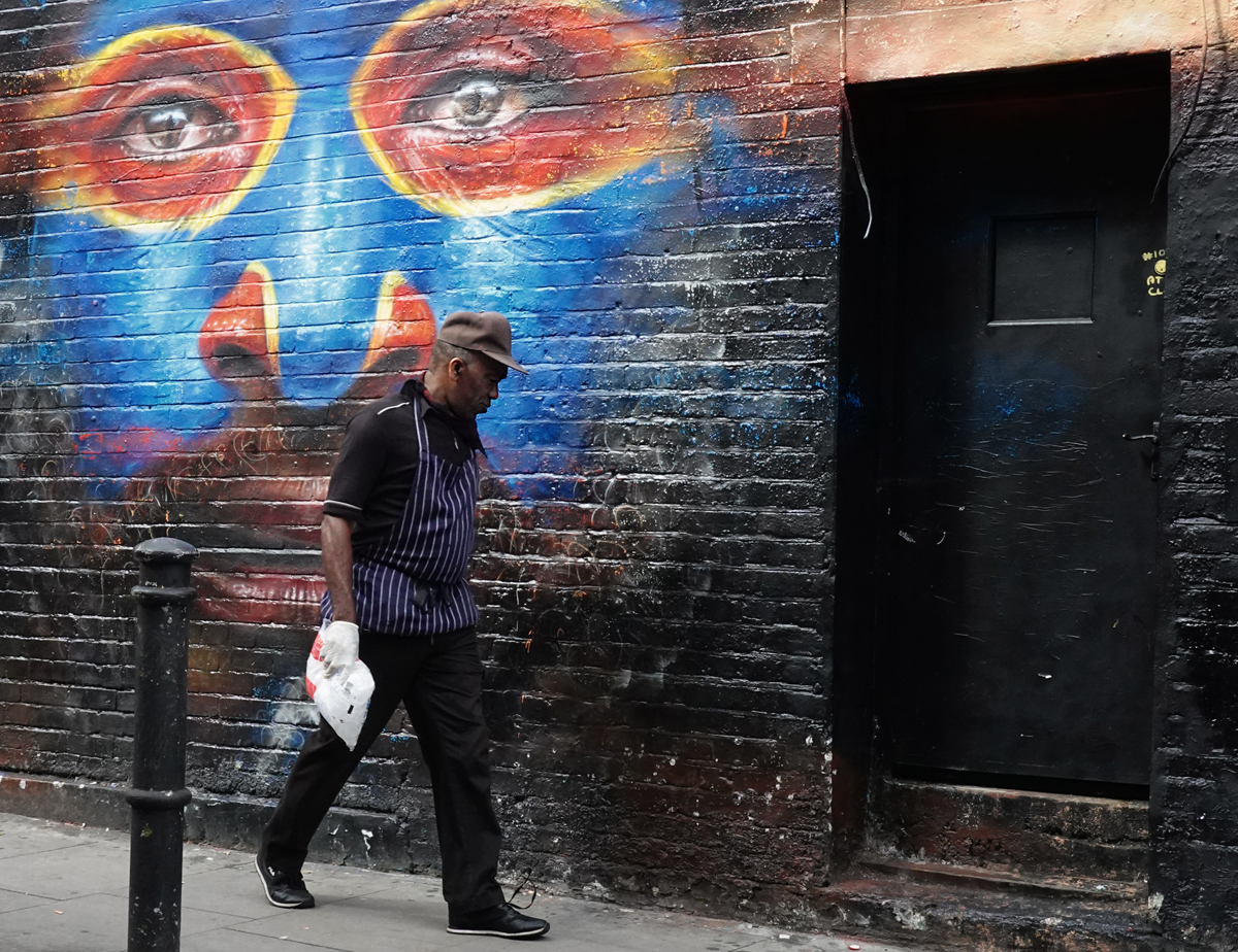 Street photography, London street art, mural, restaurant worker, London street scene, UK