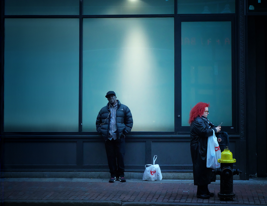 Street photography, lonely people, urban isolation, blue, man with headphones, people with shopping bags, fire hydrant, Red hair woman, Massachusetts Avenue, Boston