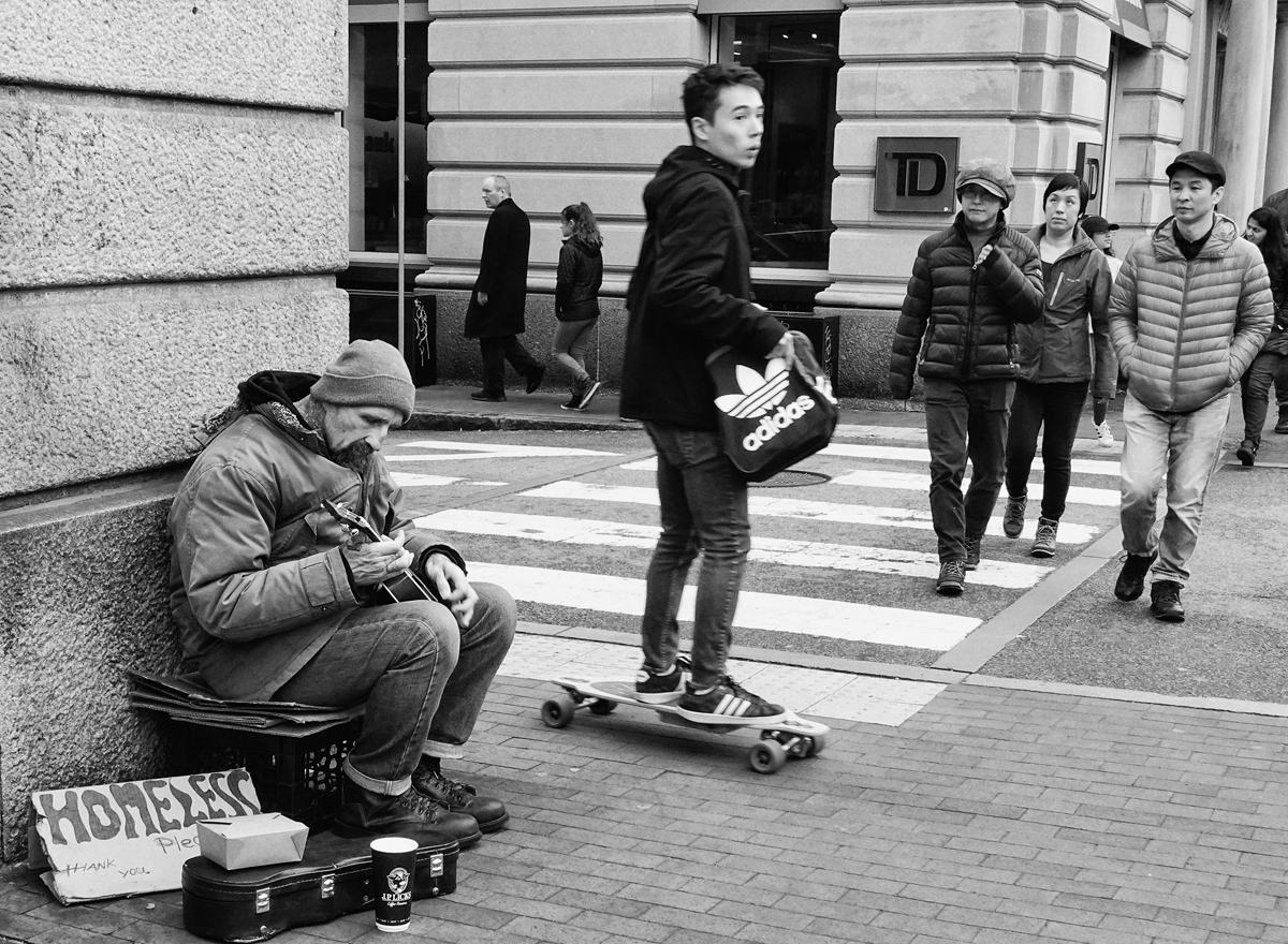 Street photography, Skateboarder, street musician, homeless, Massachusetts Avenue, Boston